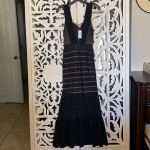 The black Martini Gown size XS, brand new.